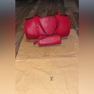 Red leather Louis Vuitton purse with clutch